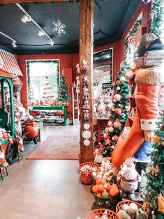 This may contain: the inside of a store with christmas decorations