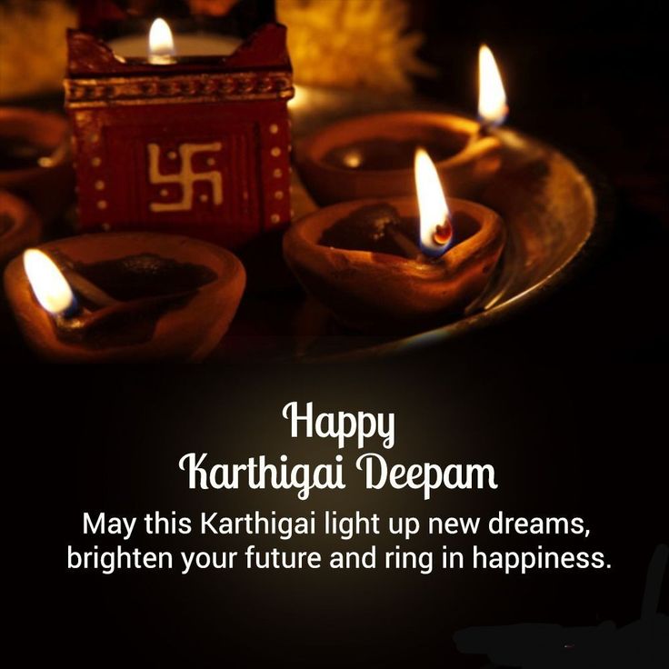 This may contain: happy kartihaai deepam message with lit candles