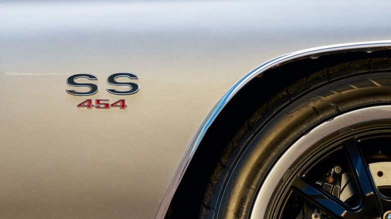 Chevy SS 454 fender badge on a restomodded classic Chevy with aftermarket wheels