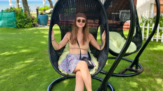 Ewa poses for photos outside the bungalow. Photo courtesy of Ewa