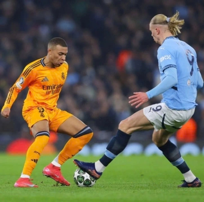 Kylian Mbappe (L) and Erling Haaland in Real Madrids 3-2 victory over Man City 3-2 at the Champions League in Etihad, Manchester, U.K., Feb. 11, 2025. Photo by Reuters