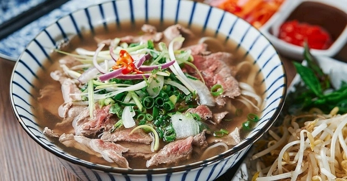 A bowl of beef noodle soup. Photo by TasteAtlas