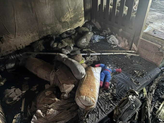 The bed, blankets and pillows inside the room on the 3rd floor - where 4 people were found dead - were burned and filled with soot. Photo: Provided by police