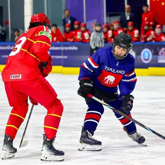 Queen Suthida (R) during a hockey match in 2024. Photo by Instagram/@hockey.worldwide