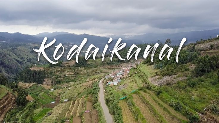 This may contain: an aerial view of the mountains and rice fields in kodaki, indonesia with text overlay