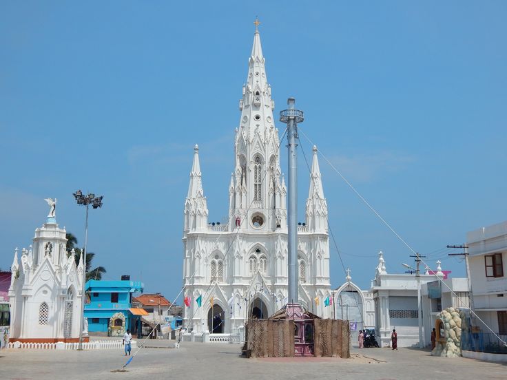 This may contain: a large white building with many spires