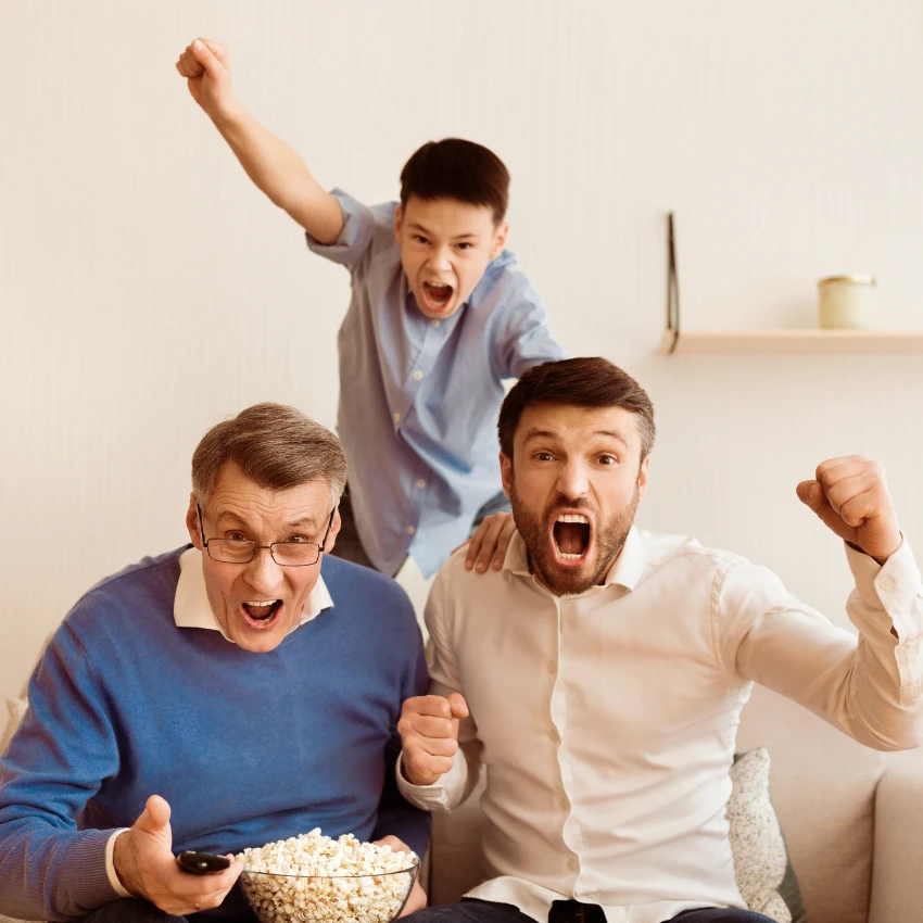 Family feeling happiness and pleasure while watching sports