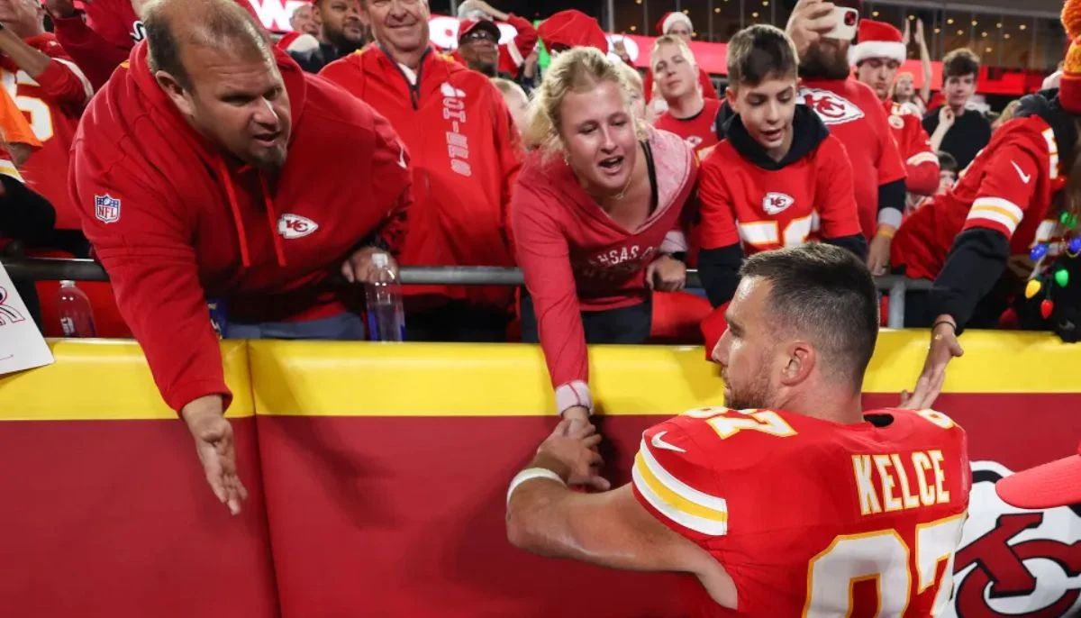 Another man in a suit joined and shook his head at the camera
