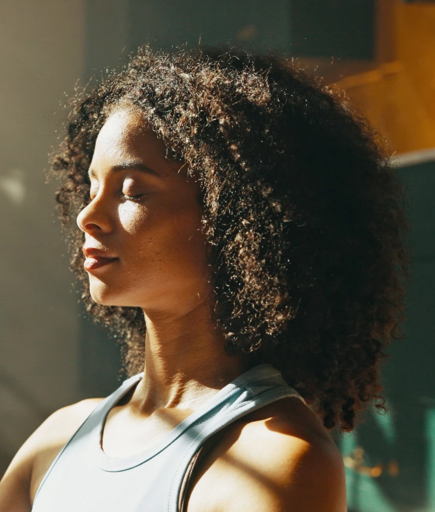Relaxed person focuses on breath showing way to handle stress