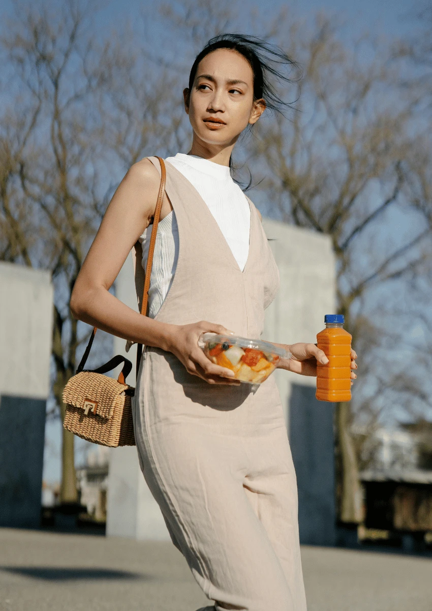 young woman carrying healthy snacks