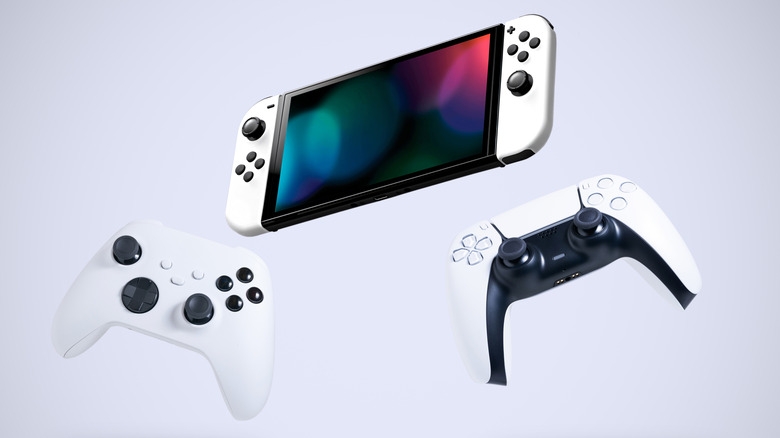Nintendo Switch, PlayStation 5 controller, and Xbox One controller on white background
