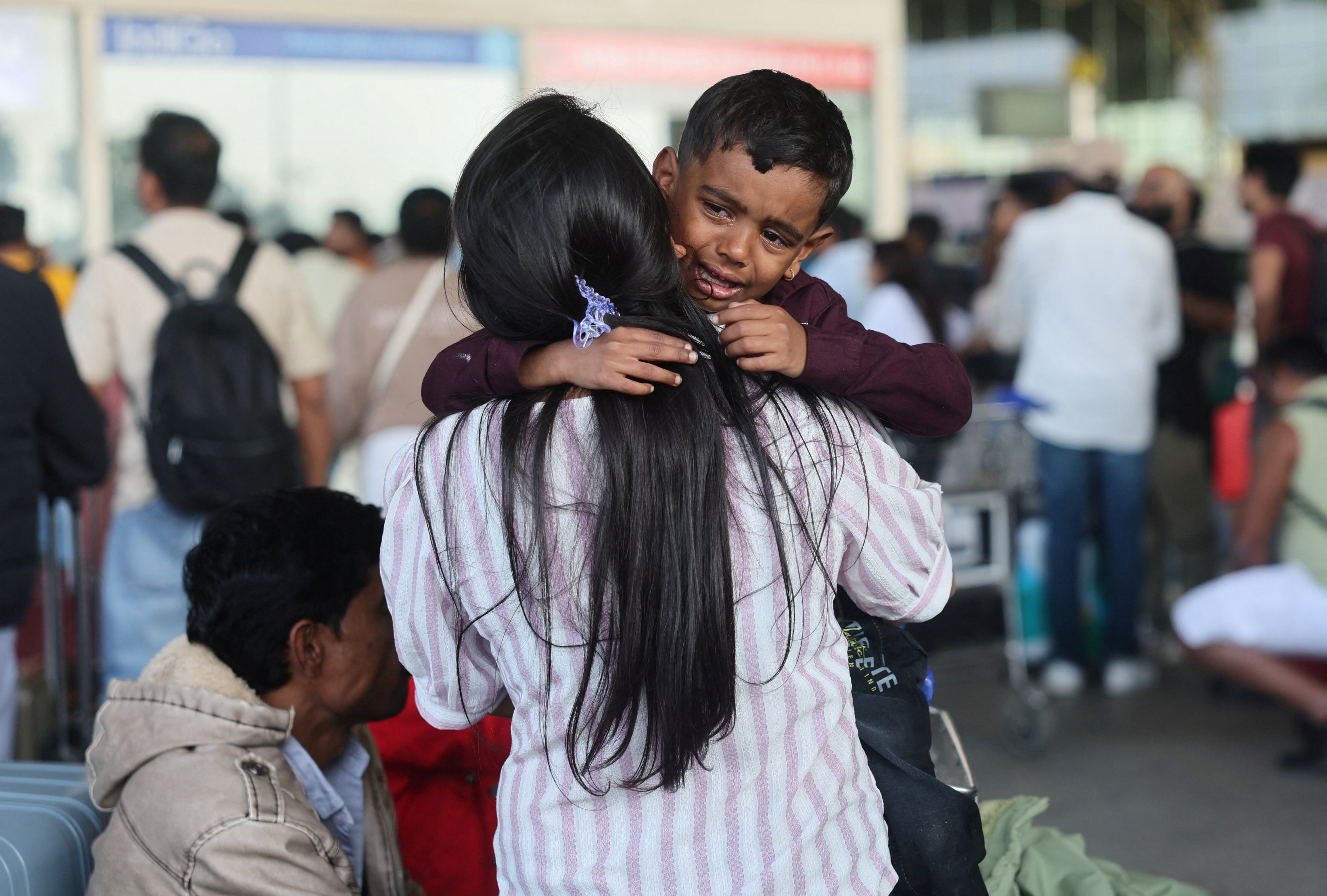 The child was seen crying at Mumbai airport.