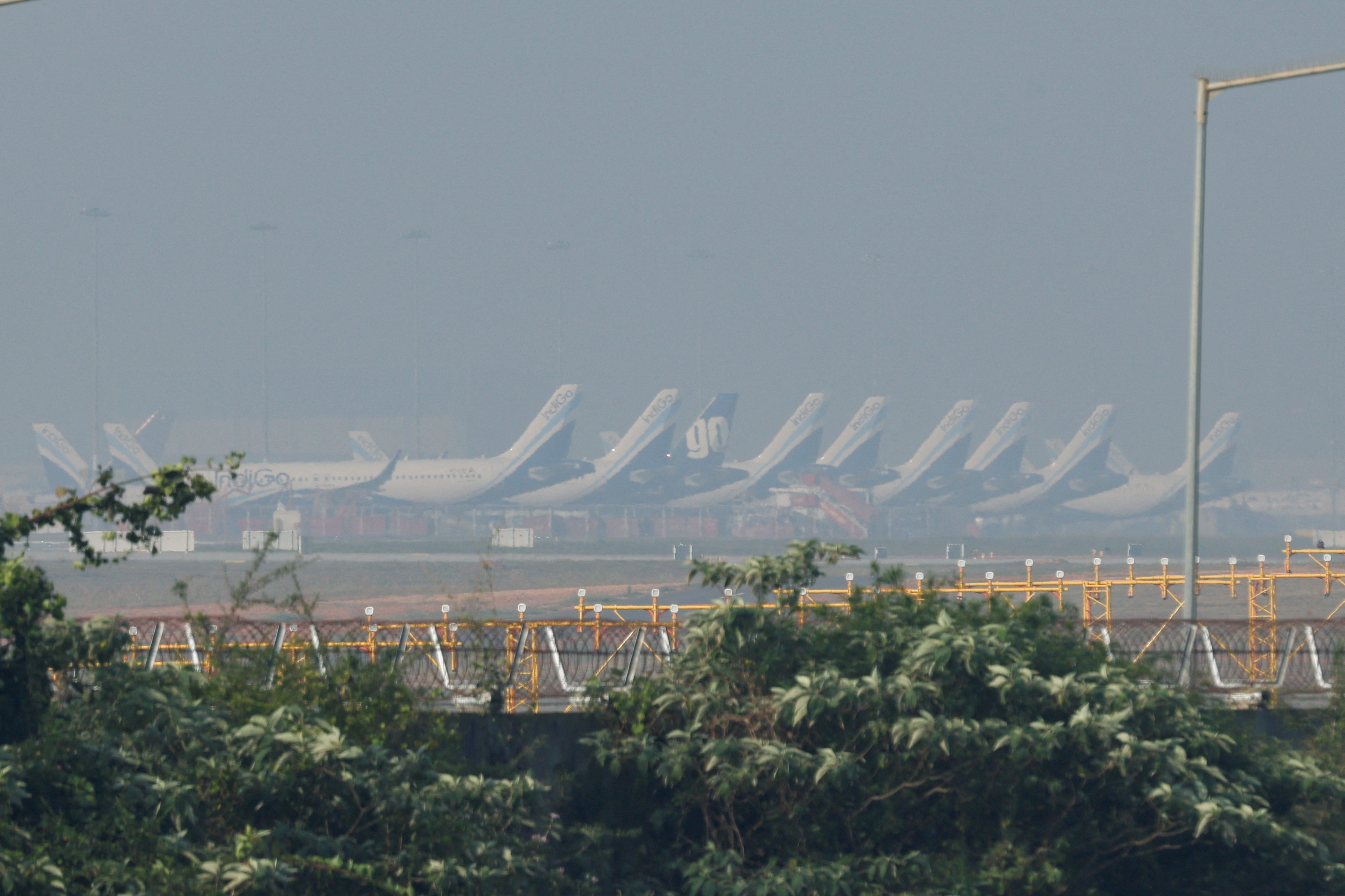 Due to shortage of crew at Bengaluru airport, many Indigo flights were seen grounded i.e. parked.