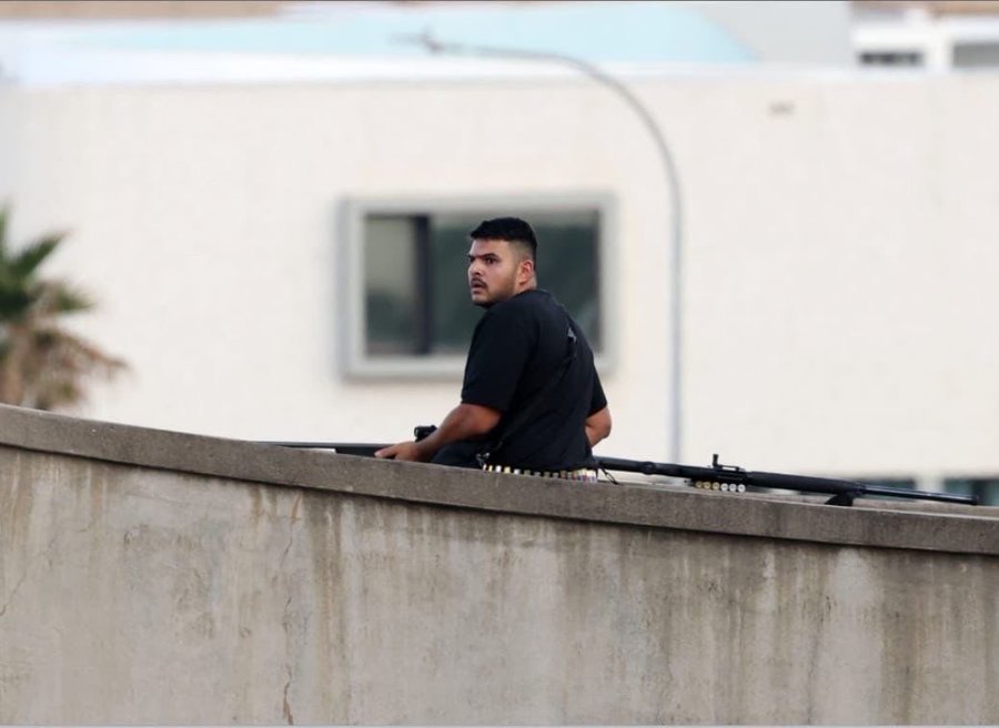 The picture is of 24 year old terrorist Navid Akram. He was targeting people with a sniper gun.