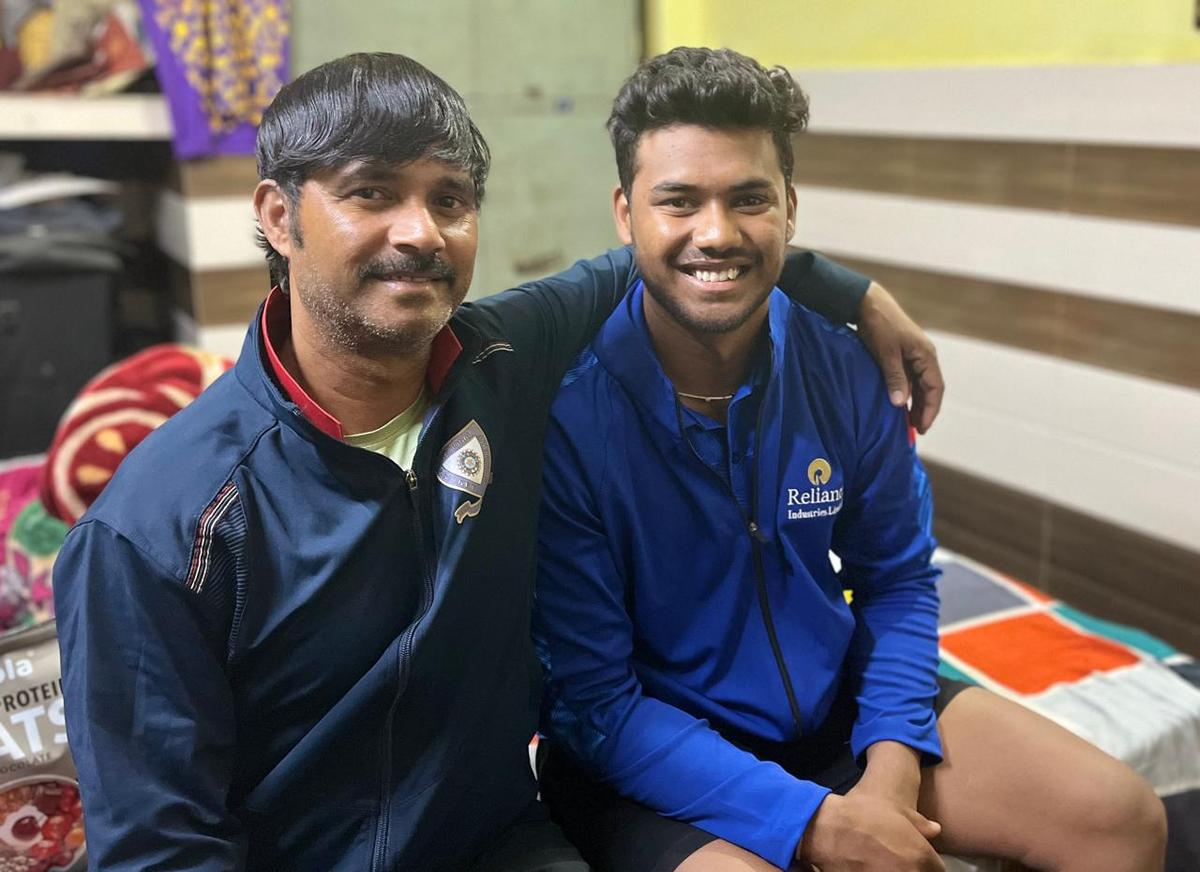 Kartik Sharma, alongside his father Manoj, whose presence has followed every stage of the journey. Kartik Sharma, alongside his father Manoj, whose presence has followed every stage of the journey.