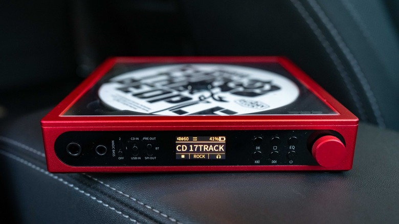 The DM15 R2R on a leather surface with Dropkick Murphy's "For The People" album loaded in the disk tray.