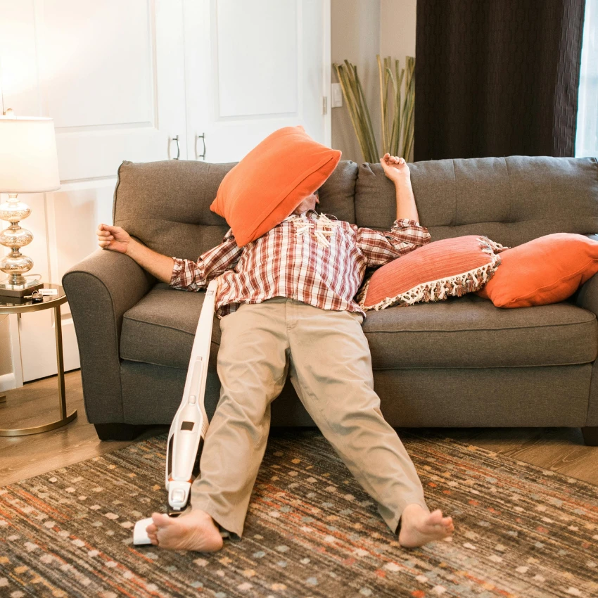 man procrastinating housework