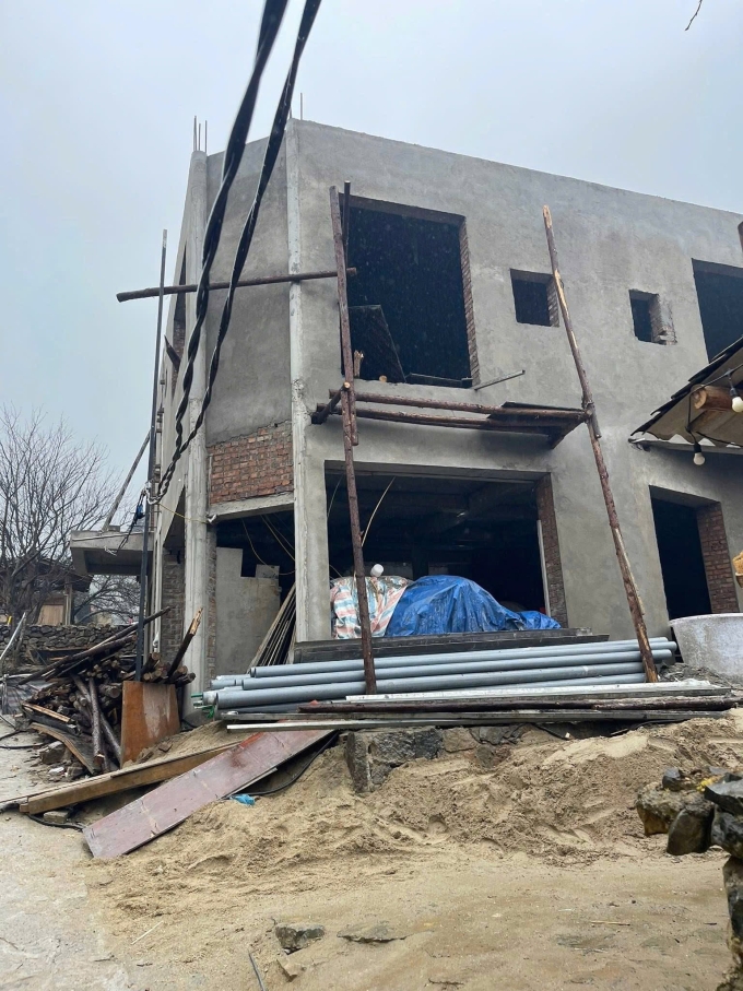 The two-storey concrete house under construction in Lo Lo Chai Village, Tuyen Quang Province. Photo provided by the homeowner