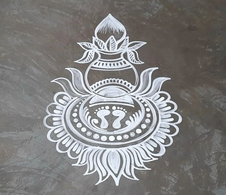 This may contain: an intricately designed design on the side of a building with a lotus and omesh symbol