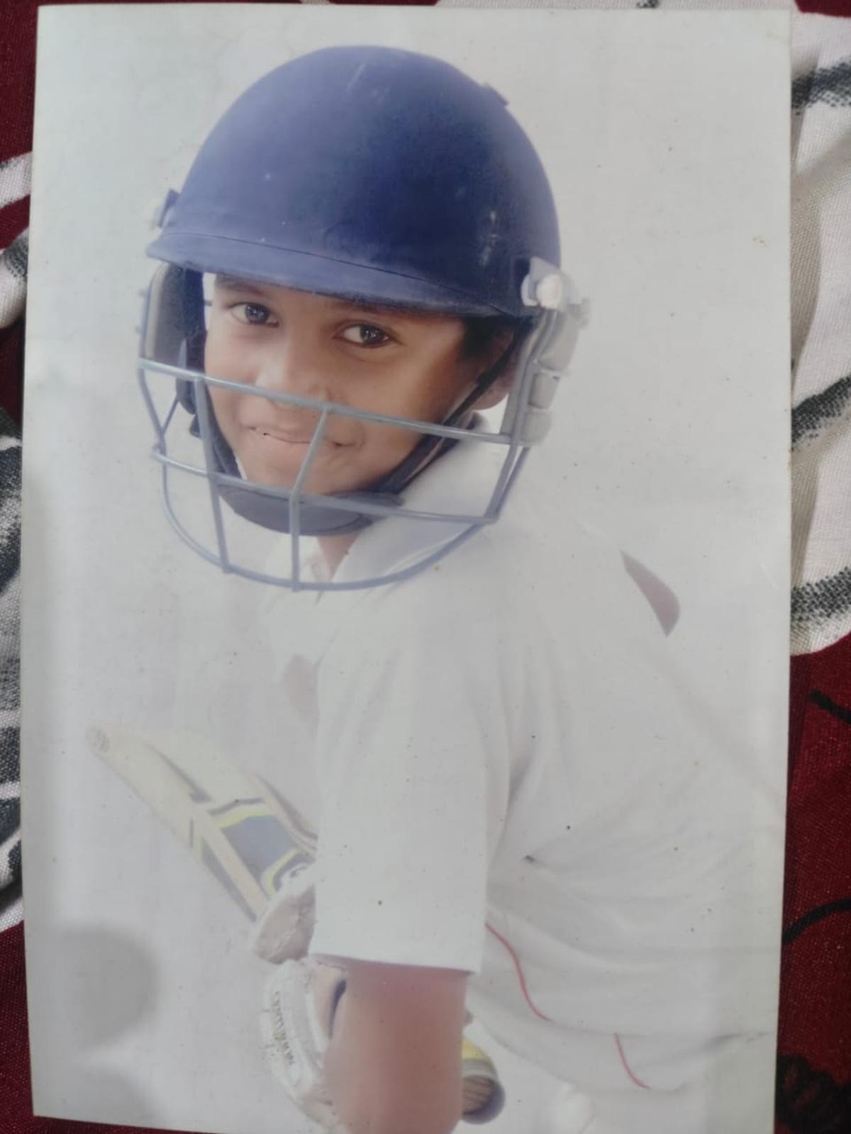 Kartik Sharma as a young batter, helmet on, learning the game one session at a time. Kartik Sharma as a young batter, helmet on, learning the game one session at a time.
