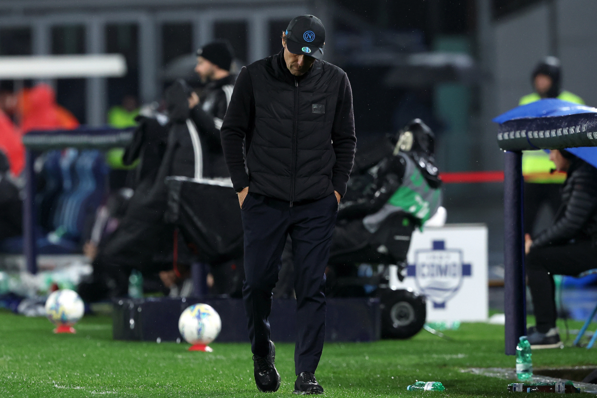 NAPLES, ITALY - FEBRUARY 10: Antonio Conte, head coach of SSC Napoli, looks down in disappointment during the Coppa Italia match between SSC Napoli and Como 1907 at Stadio Diego Armando Maradona on February 10, 2026 in Naples, Italy. (Photo by Francesco Pecoraro/Getty Images)