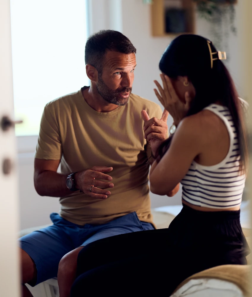 man asking woman question to find out if she's lying