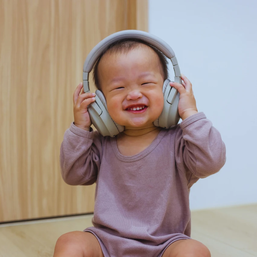 baby wearing headphones only takes babies two days to learn rhythm