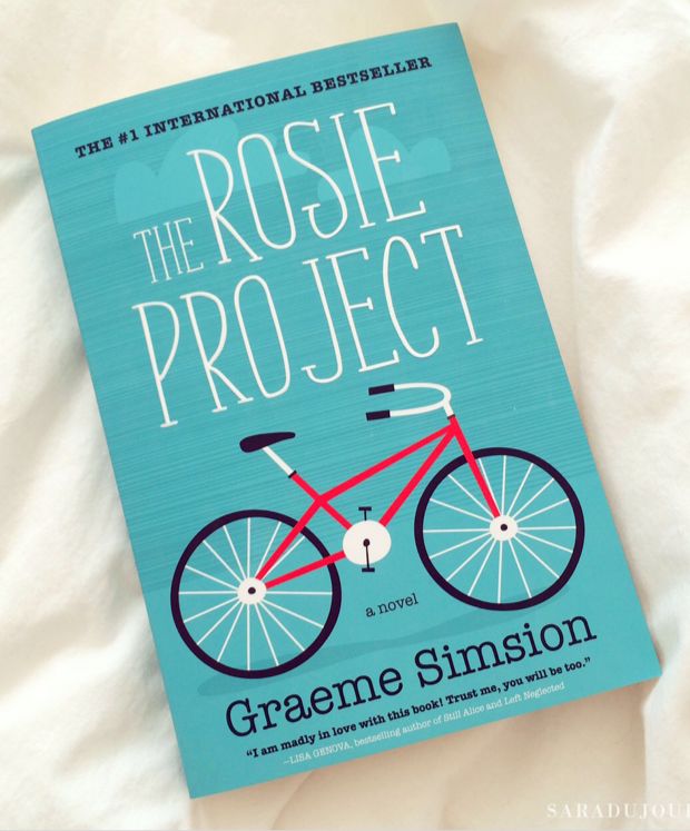 This may contain: the book cover for the rose project by cremee simpsonon on a bed