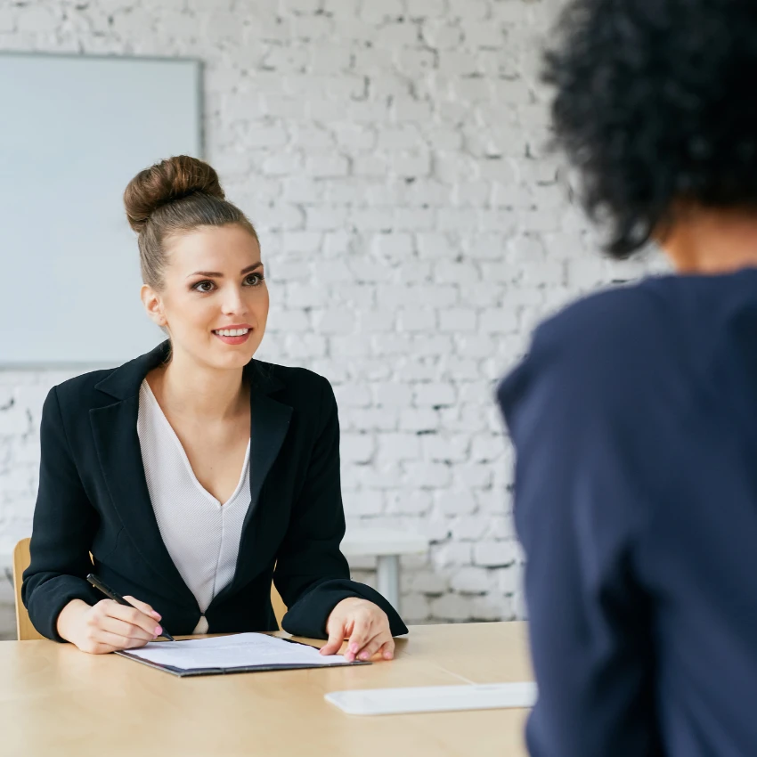 worker meeting with a reverse recruiter