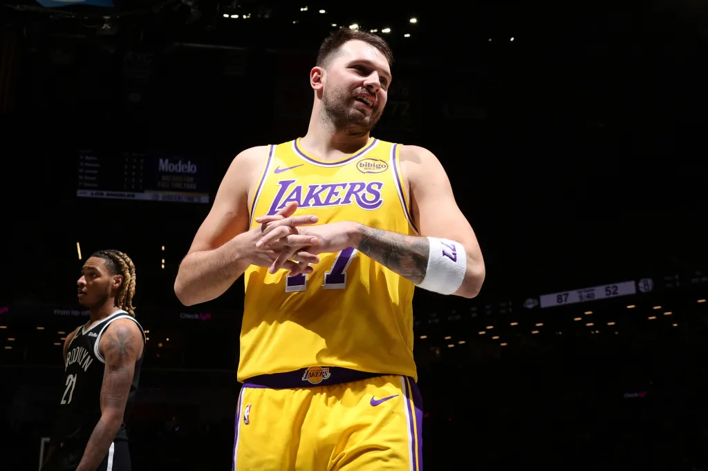 Luka Doncic #77 of the Los Angeles Lakers on the court during a game against the Brooklyn Nets.