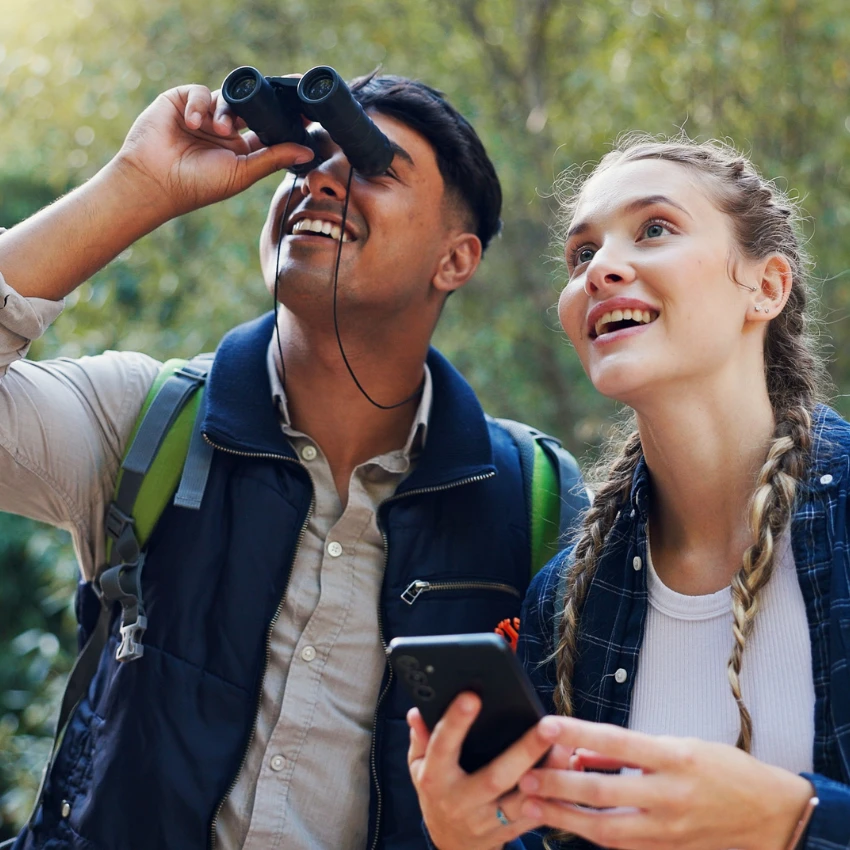 Birding couple enjoying birdwatching and making it their personality