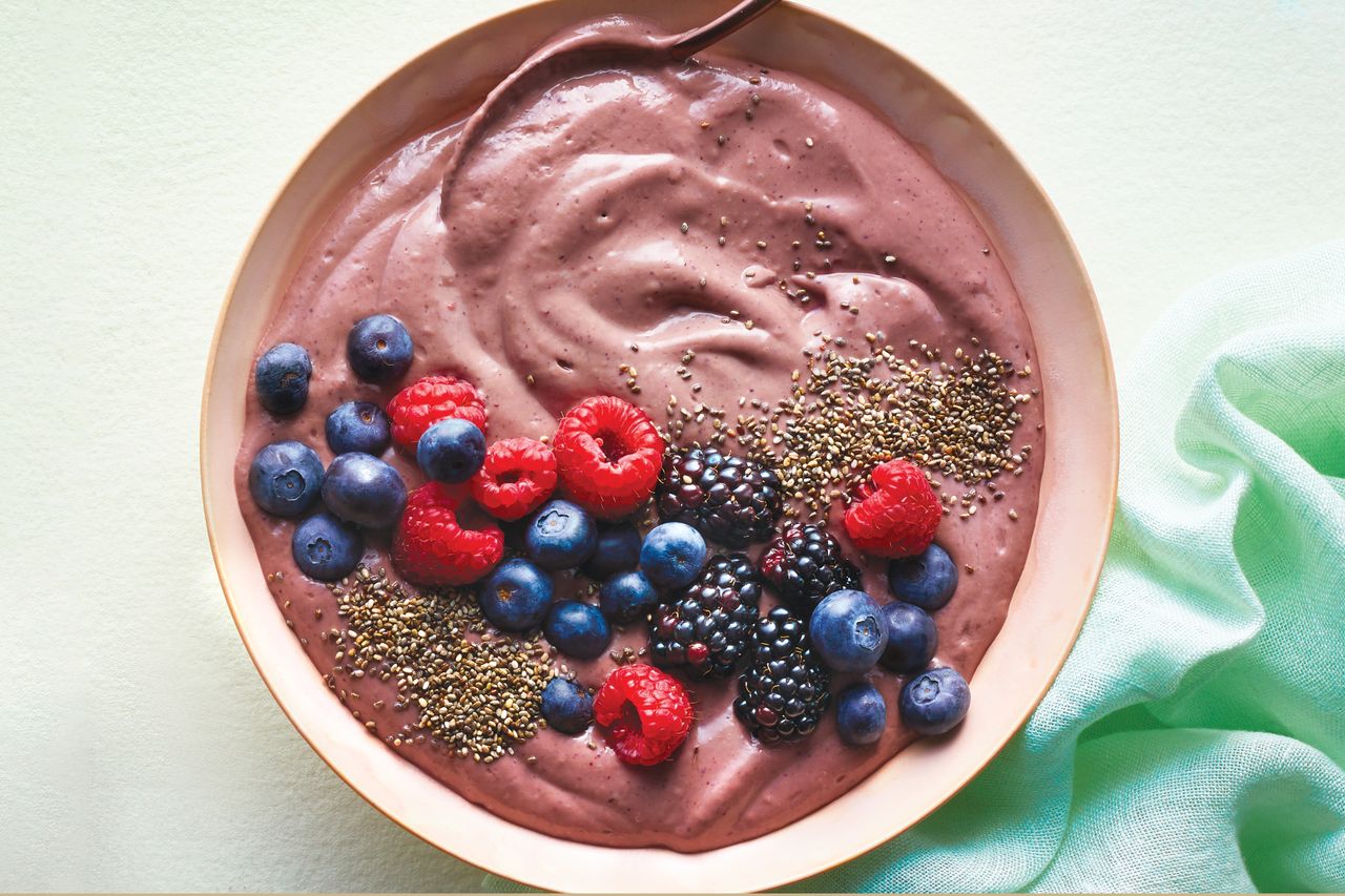 a recipe photo of the Avo-Berry Smoothie Bowls Credit: EatingWell