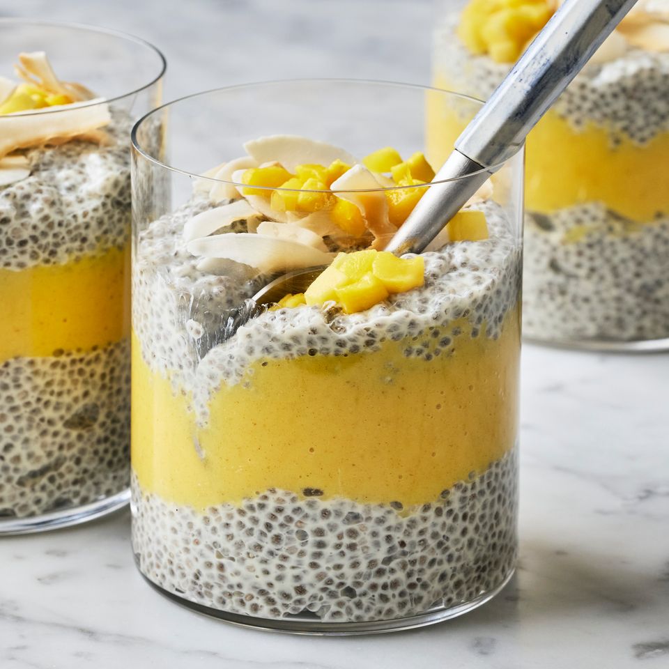 Recipe image of Coconut-Mango Chia Pudding. Credit: Photographer: Greg Dupree, Prop Stylist: Julia Bayless, Food Stylist: Chelsea Zimmer.