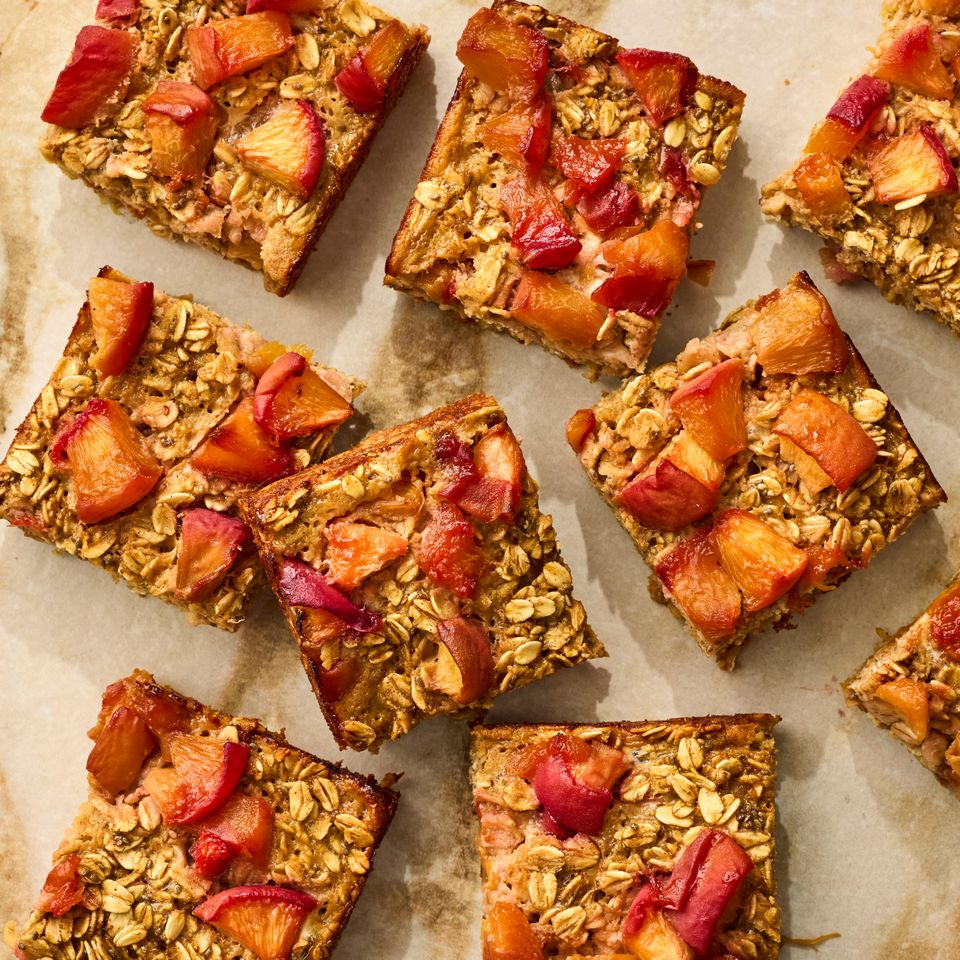 A recipe photo of Peach-Oatmeal Breakfast Bars Credit: Photographer Victor Protasio, Food Stylist Chelsea Zimmer, Prop Stylist Hannah Grennwood.