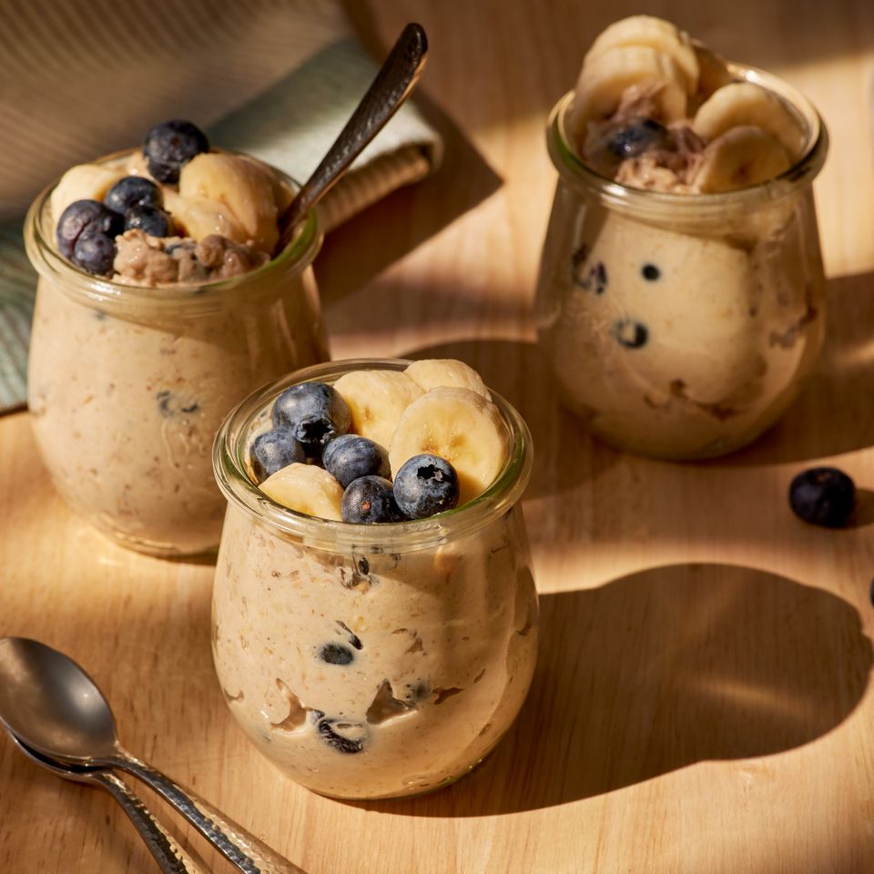 a recipe photo of the High-Protein Peanut Butter, Banana & Blueberry Overnight Oats Credit: Photographer: Jake Sternquist, Food Stylist: Annie Probst, Prop Stylist: Joseph Wanek
