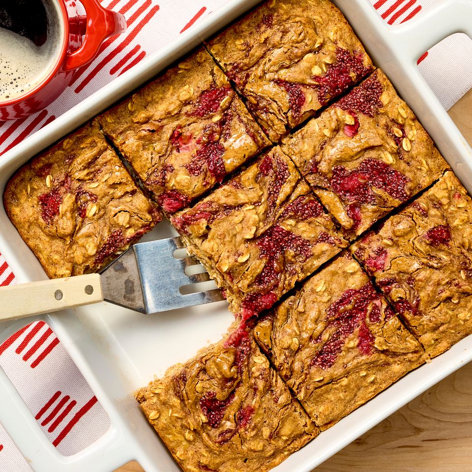 Recipe image of High-Protein Almond Butter & Strawberry Oatmeal Bars Credit: Photographer: Robby Lozano, Food Stylist: Margaret Monroe Dickey, Prop Stylist: Josh Hoggle