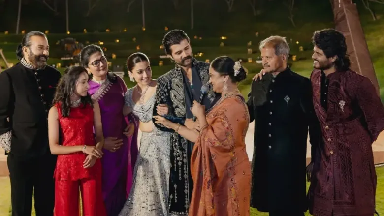 A family standing in traditional beautiful dresses 