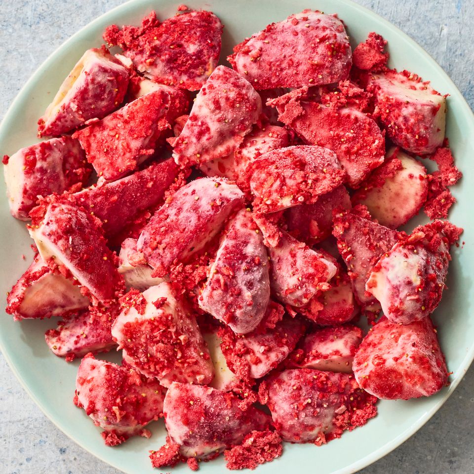 Recipe image of Lemon-Strawberry Frozen Yogurt Bites Credit: Photographer: Greg Dupree, Food Stylist: Chelsea Zimmer, Prop Stylist: Christina Daley.