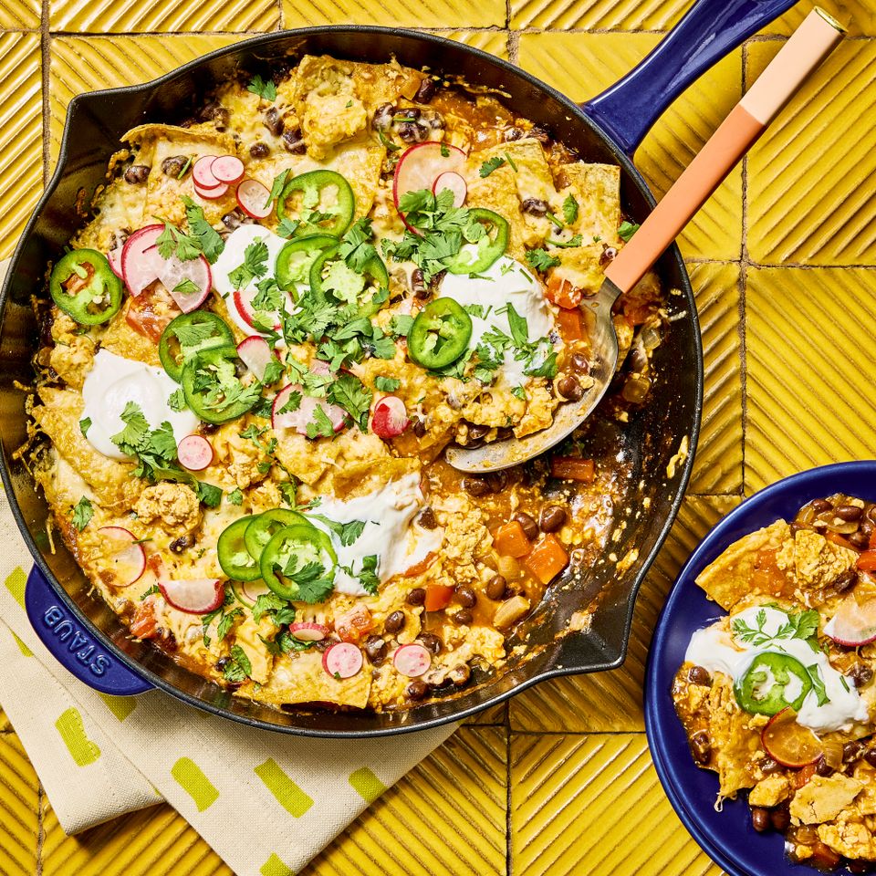 Recipe image of High-Protein Enchilada Skillet Credit: Photographer: Morgan Hunt Glaze, Prop Stylist: Claire Spollen, Food Stylist: Chelsea Zimmer