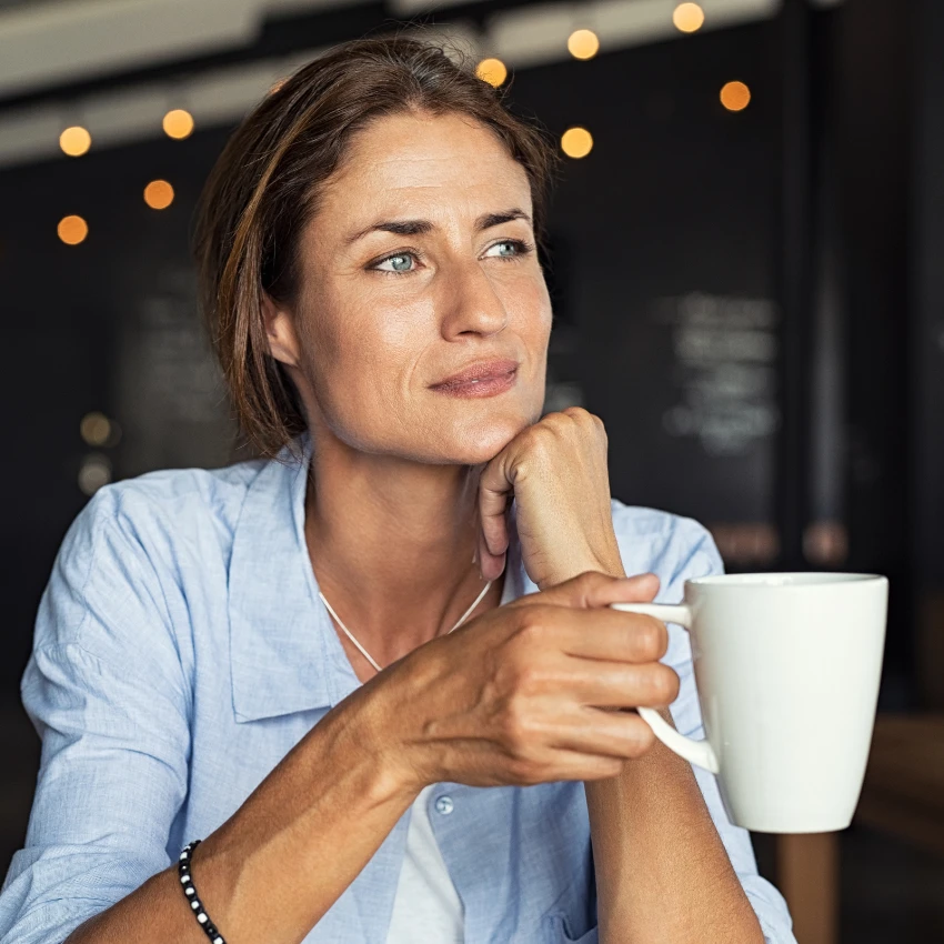 woman enjoying her morning coffee