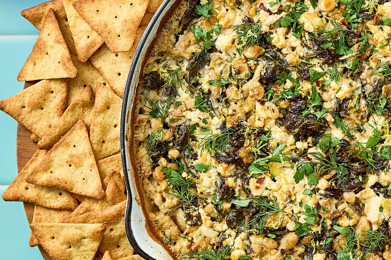 Recipe image of Spanakopita-Inspired Skillet Beans Credit: Photographer: Brittney Cottrell, Food stylist: Isabelle Easter, Prop Stylist: Keoshia McGhee