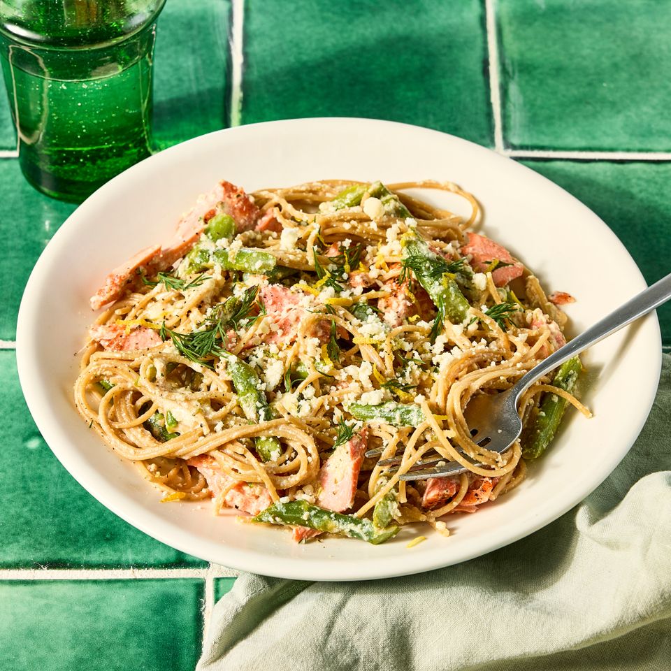 an image of the Creamy Salmon & Asparagus Pasta Credit: Photographer: Hannah Hufham, Food Stylist: Julian Hensarling, Prop Stylist: Christina Daley