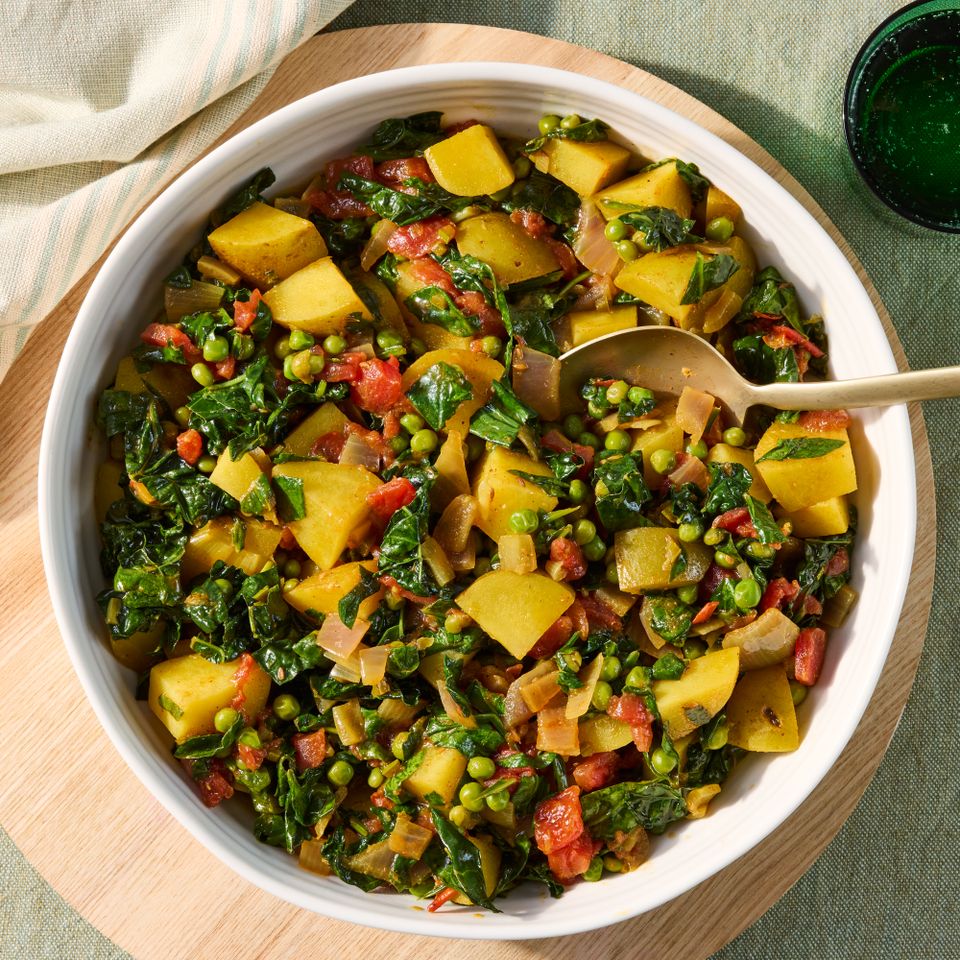 a recipe photo of the Saag Aloo Matar Credit: photographer: Jen Causey, food stylist: Julian Hensarling, prop stylist: Josh Hoggle