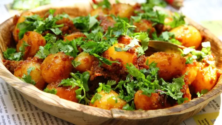 potato masala garnished with green coriander leaves
