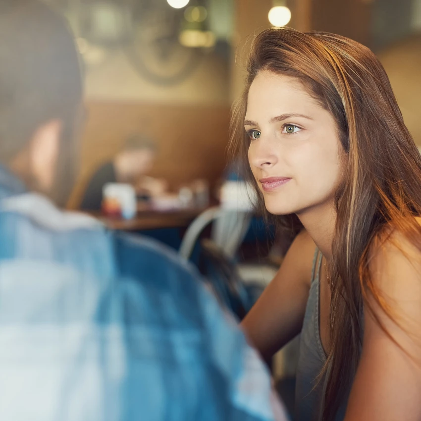 Couple on a date making eye contact showing intentional intimacy