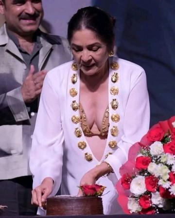 Is Neena Gupta pregnant at 66? Netizens think as actor caresses bump in white saree at Rashmika Mandanna-Vijay Deverakonda wedding reception