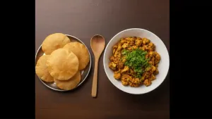 Your cauliflower curry is ready. Serve it hot with rice or puris.