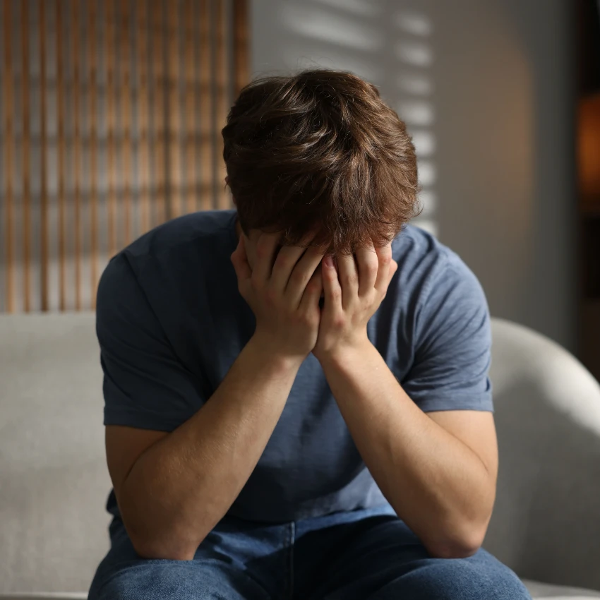 young male adult struggling with mental health