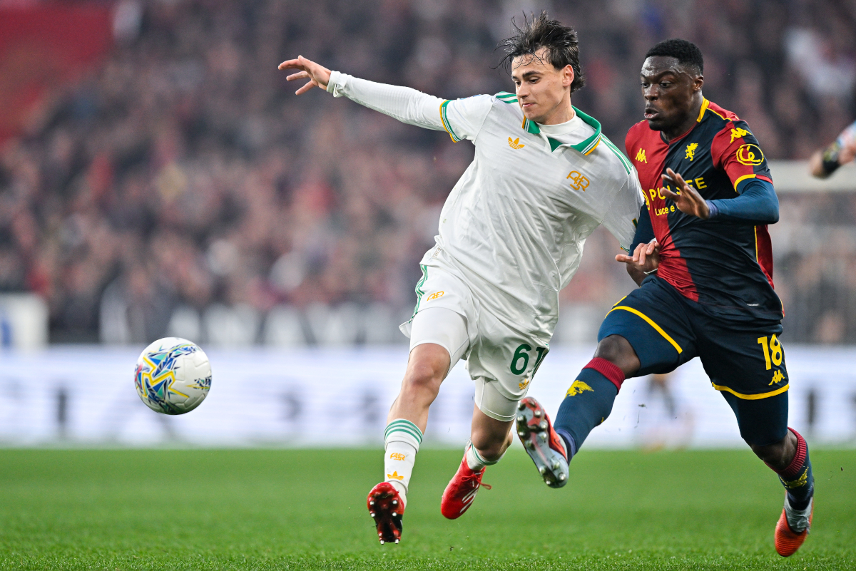 GENOA, ITALY - MARCH 8: Niccolò Pisilli of Roma (left) and Caleb Ekuban of Genoa vie for the ball during the Serie A match between Genoa CFC and AS Roma at Luigi Ferraris Stadium on March 8, 2026 in Genoa, Italy. (Photo by Getty Images)