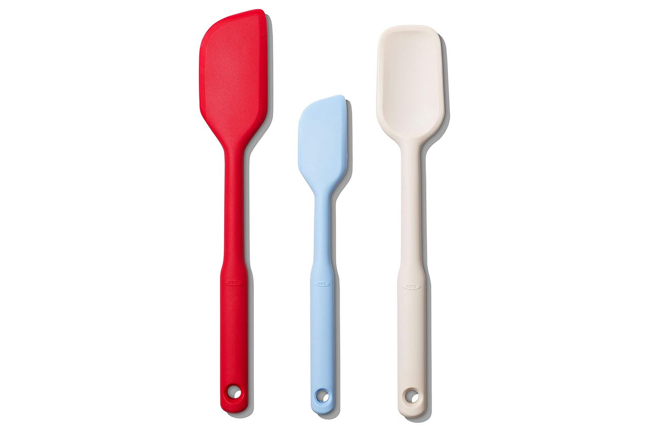 Three silicone spatulas of varying sizes and colors placed in a row Credit: Amazon